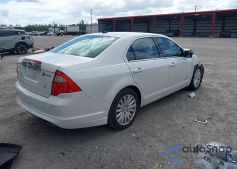 2012 Ford Fusion Hybrid из США, поврежденный, VIN 3FADP0L30CR216282